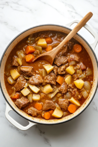 final-simmer-of-irish-stew-checking-liquid-levels-in-dutch-oven