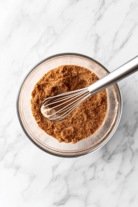 making-crumble-mix-with-flour-sugars-cinnamon-and-butter-2132298-683x1024-9275137 step 2