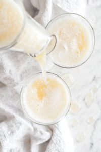 pour-pina-colada-into-glasses-ready-to-serve