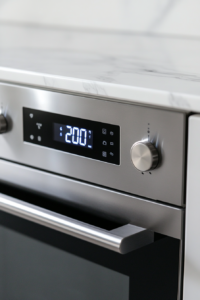 This image shows an oven preheating to the required temperature of 200°C (375°F), setting the stage for baking.