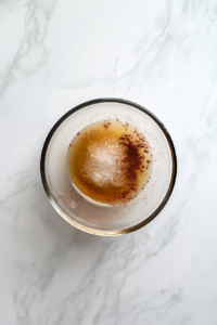 risen-dough-being-rolled-out-into-a-large-rectangle-on-a-floured-surface