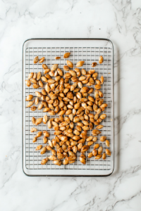roasted-pumpkin-seeds-cooling-on-wire-rack-or-tray-before-storage