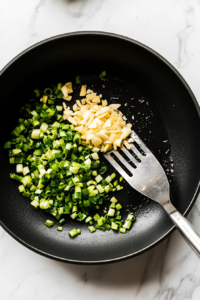 sauteing-garlic-and-ginger-to-bring-out-deep-flavor