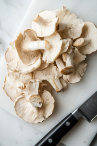 slicing-mushrooms-into-rounds-for-scallops