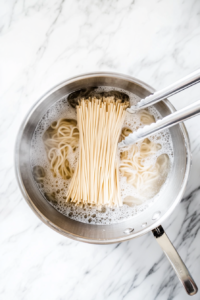 soba-noodles-in-boiling-water-for-thai-noodle-salad