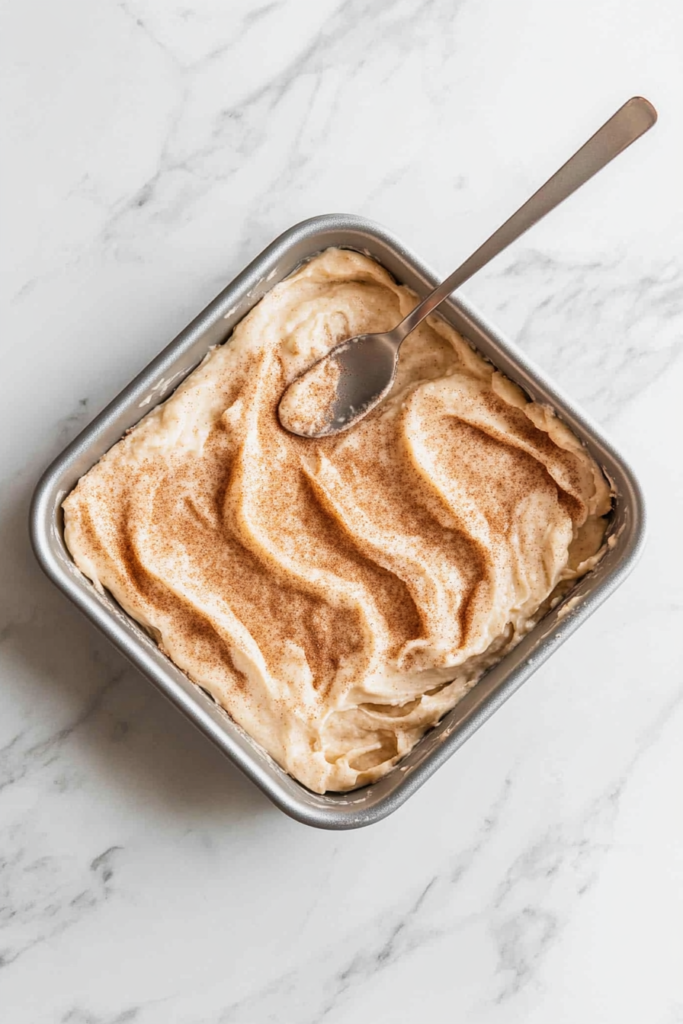 spreading-the-remaining-batter-evenly-in-the-baking-pan-1512188-683x1024