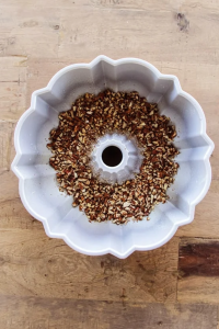 sprinkle the chopped walnuts over the bottom