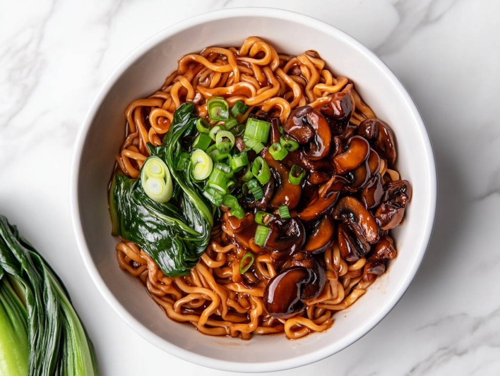 teriyaki-noodles-in-white-bowl-tossed-in-savory-sauce-with-green-onions-and-beans