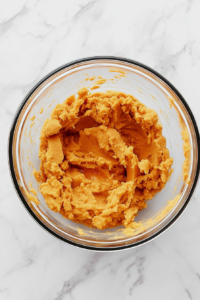 adding-milk-to-sweet-potato-cornbread-mixture-in-glass-bowl-2