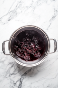 deglazing-caramelized-onions-in-aluminum-pot