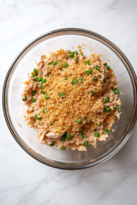 extra-breadcrumbs-added-tuna-mixture-in-glass-bowl