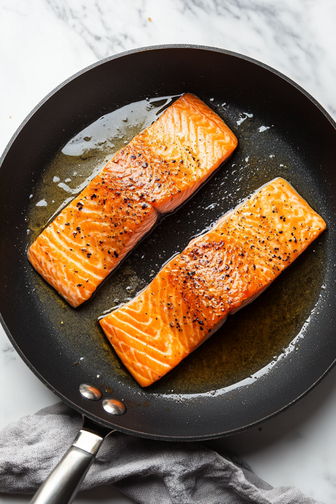 flipping-salmon-to-sear-second-side-in-hibachi-style-1403769-683x1024
