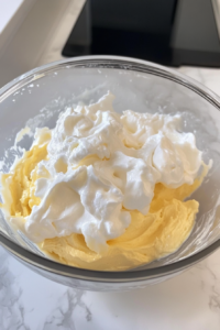 folding-castella-batter-in-glass-bowl-on-white-marble