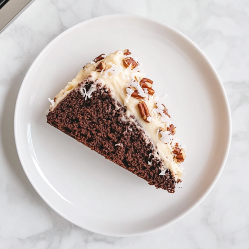 german-chocolate-cake-whole-top-view-on-white-marble-2