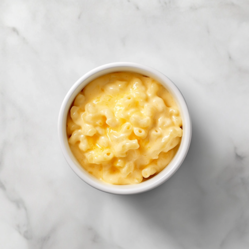 mac-and-cheese-in-white-ceramic-bowl-on-marble