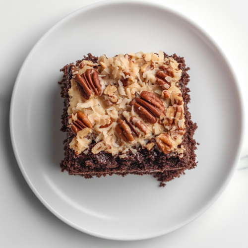 serving-german-sweet-chocolate-cake-square-slice-on-white-ceramic-plate-final-presentation