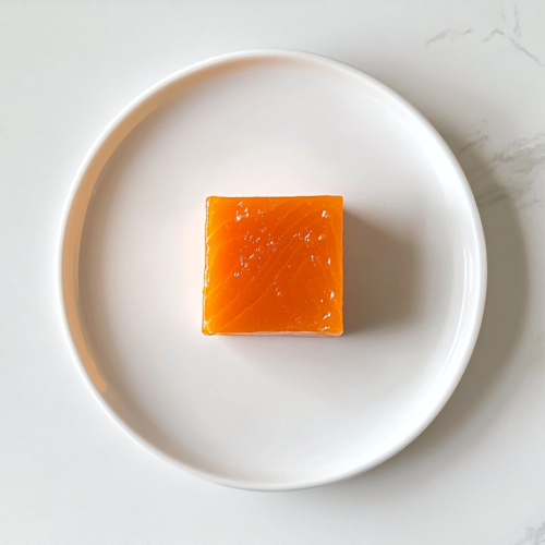 serving-smoked-salmon-on-white-ceramic-plate-marble-surface