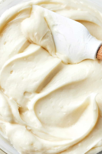 Add confectioner's sugar, milk and vanilla extract