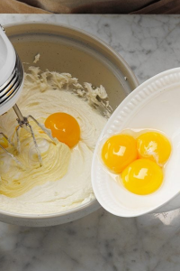 Add eggs one at a time