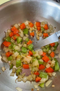 Add the chopped onion, celery, and carrots.