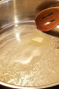 In a large pot, melt the butter over medium heat.