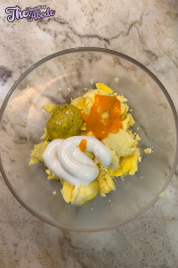 Mash the yolks with mayonnaise