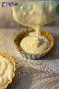 Pour the lemon filling into the prepared graham