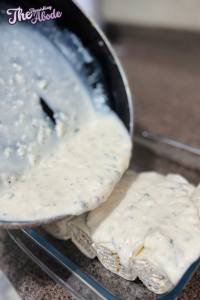 Pour the warm white sauce evenly