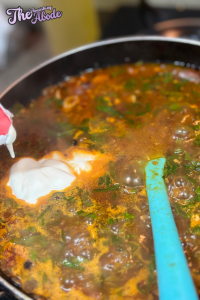 Reduce heat to low and slowly add the heavy cream