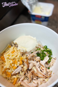 Start by mixing the shredded chicken
