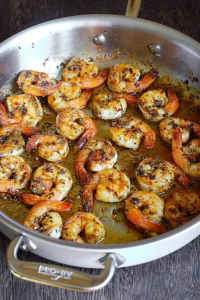When the oil is hot, add the shrimp,