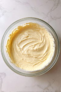 cake-batter-mixed-in-large-glass-bowl