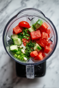 chopped-vegetables-in-a-glass-blender-for-gazpacho