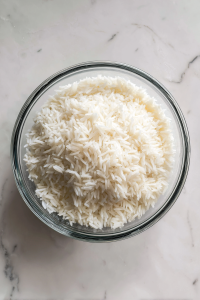 cooked-white-rice-in-glass-bowl-marble-background