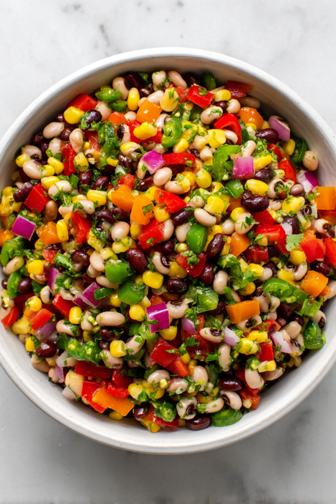 cowboy-caviar-served-with-tortilla-chips-on-white-marble