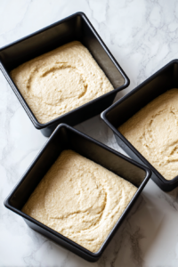 dividing-batter-baking-square-pans-marble-top