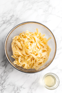 drained_al_dente_pasta_kept_warm_after_cooking_with_reserved_water-2