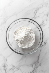 dry-ingredients-flour-baking-powder-salt-in-glass-bowl-2