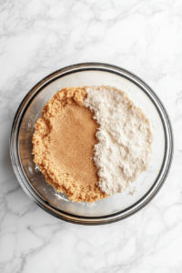 glass-bowl-with-crust-ingredients-pressed-into-pan