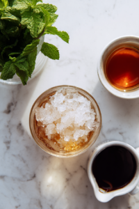 glasses-filled-with-crushed-ice-on-clean-white-marble