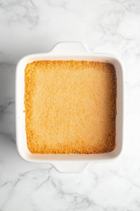 graham-cracker-crust-pressed-in-white-ceramic-baking-dish
