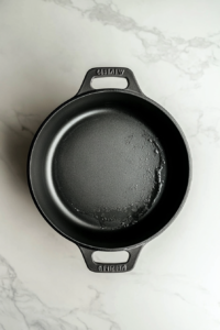 greasing-the-dutch-oven-for-making-bread