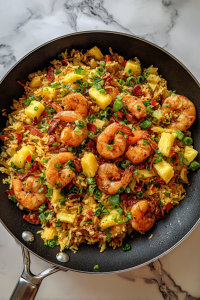 ink-tiger-prawns-cooking-in-spiced-rice-black-skillet