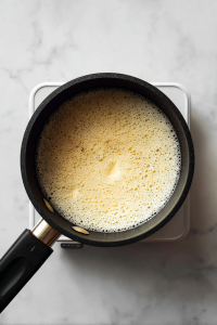 melting-butter-in-black-saucepan-for-enchilada-roux