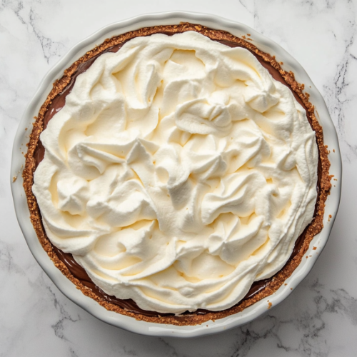 no-bake-nutella-pie-on-white-marble-with-clean-background-top-down