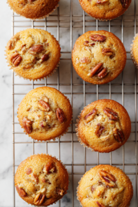 pecan-mini-muffins-cooling-on-wire-rack-on-marble-top