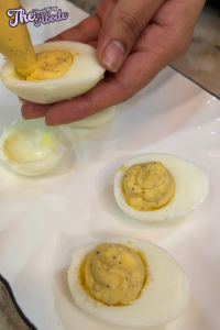 pipe the yolk mixture back