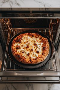 pizza-baking-inside-oven-closeup-golden-crust