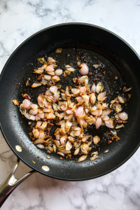 removing-bacon-from-skillet-leaving-drippings-behind