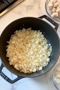 sauteing-onion-garlic-in-black-dutch-oven-marble-2